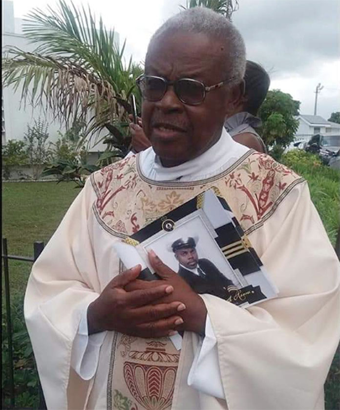 Nassau buries senior priest